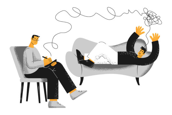 Terapeuta i pacjent w gabinecie. Pacjent prezentuje problem, terapeuta słucha i jest obecny