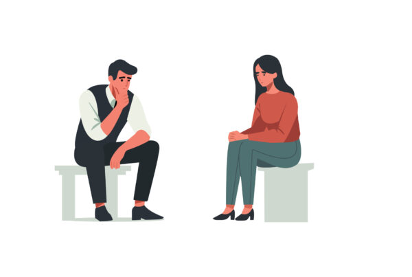 Para siedzi w milczeniu, brak komunikacji z obawy przed odrzuceniem.