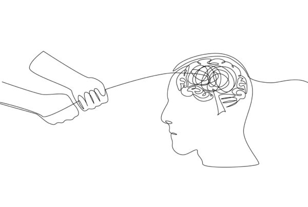 Dłonie psychoterapeuty, które wprowadzają nowe ścieżki w umyśle pacjenta.